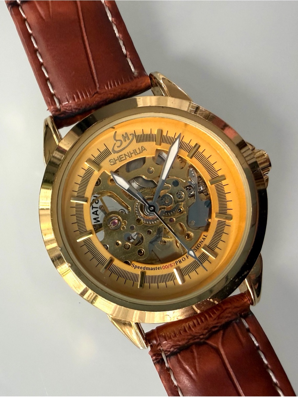 Gold Skeleton Mechanical Watch with Brown Leather Strap